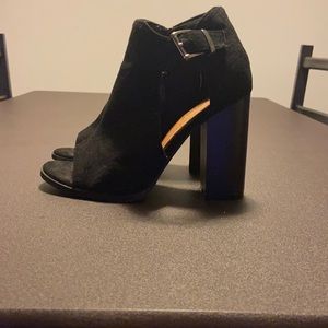 Black heels with buckle belt